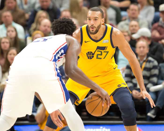 Rudy Gobert (27) guards Joel Embiid (21)